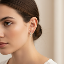 Load image into Gallery viewer, Sterling Silver Studded Huggie Earrings
