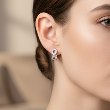 Load image into Gallery viewer, Sterling Silver Infinity Cz Huggie Earrings
